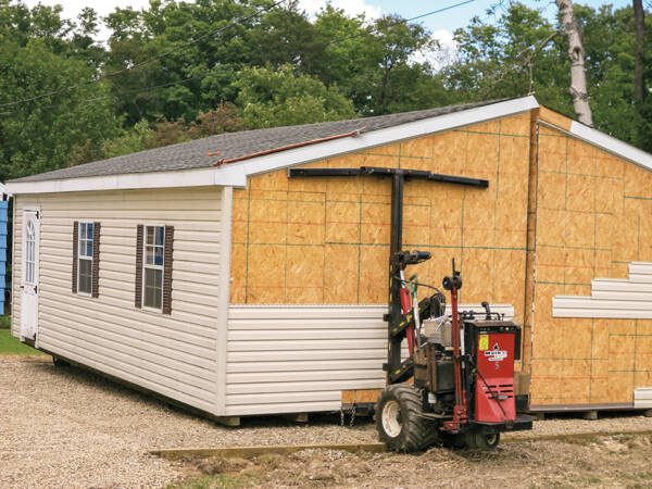 Moving a modular garage into position