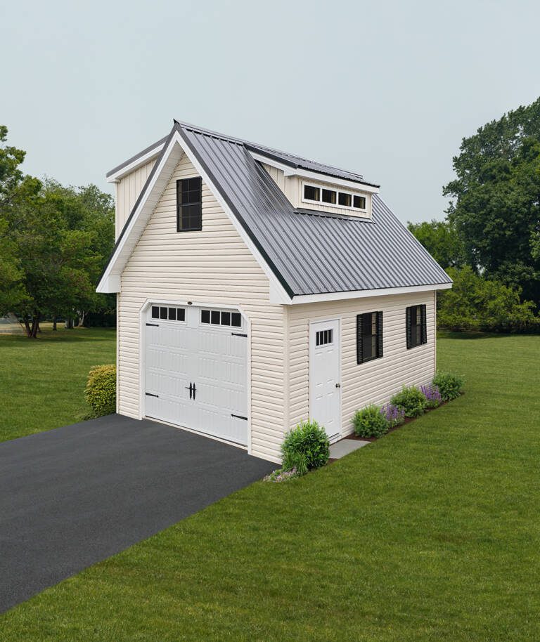 G73 | 14x24 Garage with loft, one shed dormer, and one transom dormer Pearl siding, white trim, black metal roof.